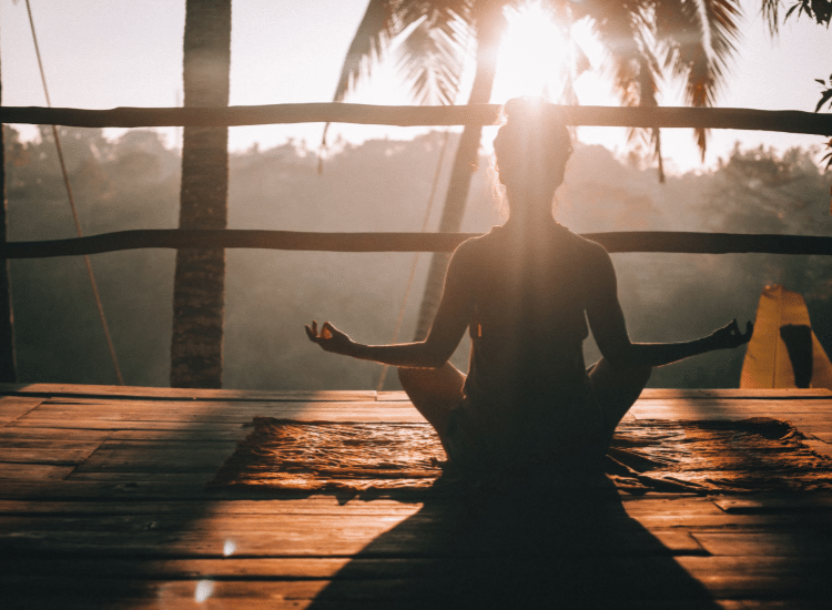 Woman doing yoga in bali Woman doing yoga in bali