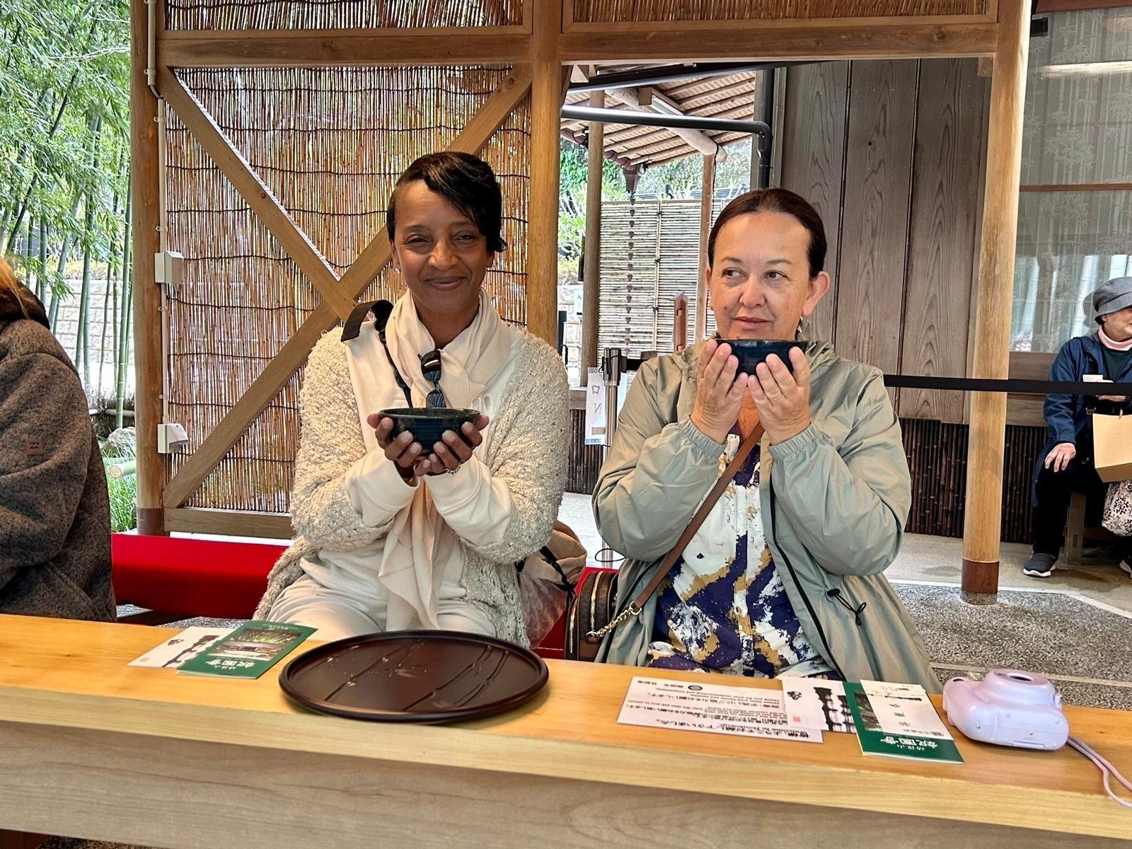 WTA travelers enjoying a peaceful tea experience during their cultural journey through Japan WTA travelers enjoying a peaceful tea experience during their cultural journey through Japan