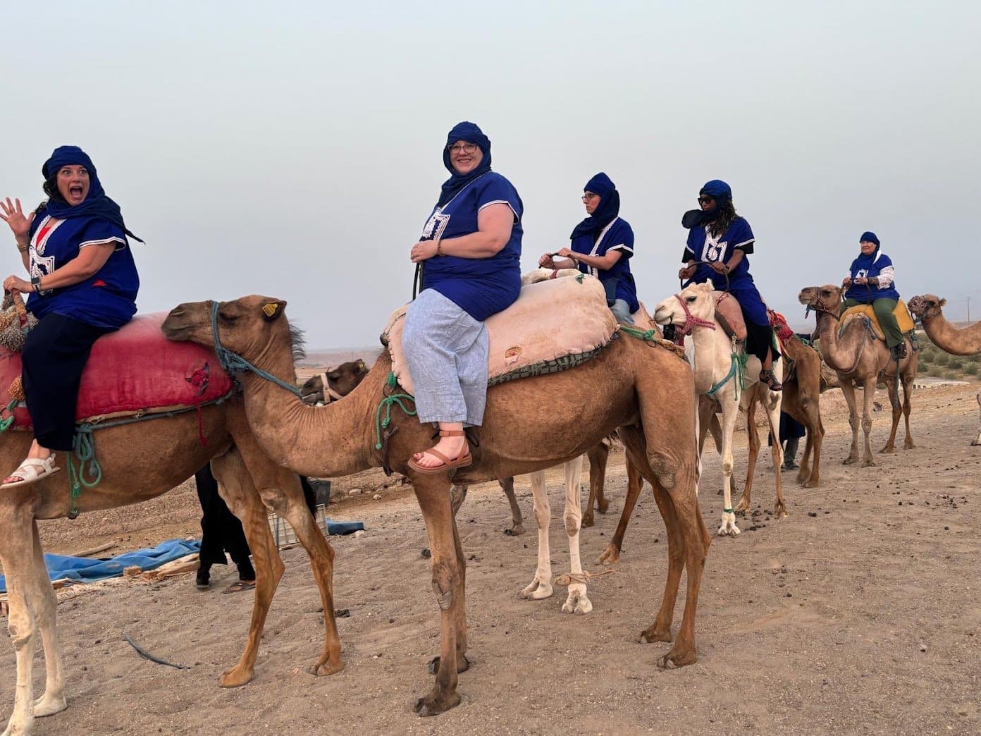Scenic travel shot (e.g., women admiring the northern lights in Iceland, riding camels in Morocco Scenic travel shot (e.g., women admiring the northern lights in Iceland, riding camels in Morocco