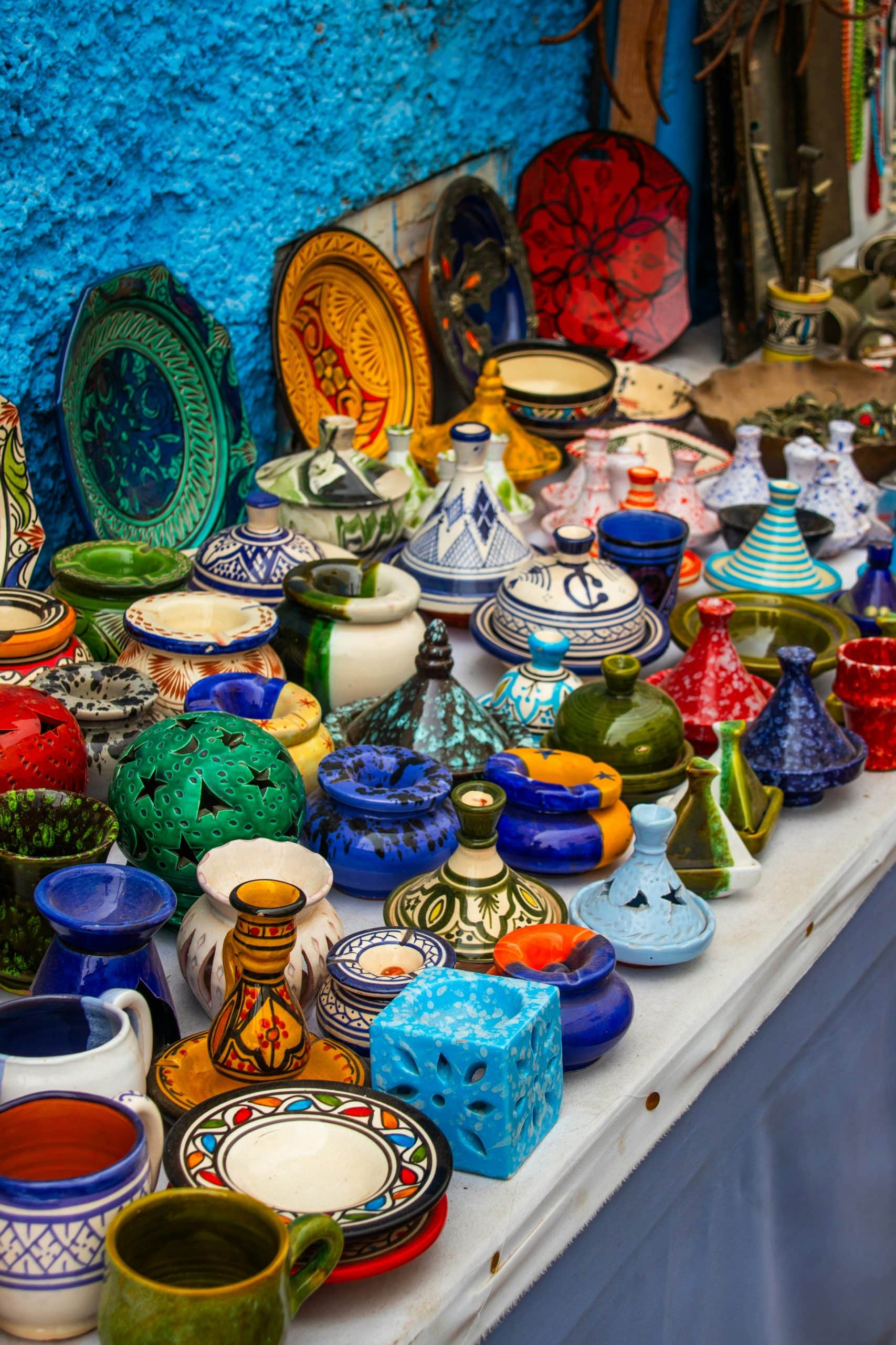 colorful Oaxacan market surrounded by textiles and pottery