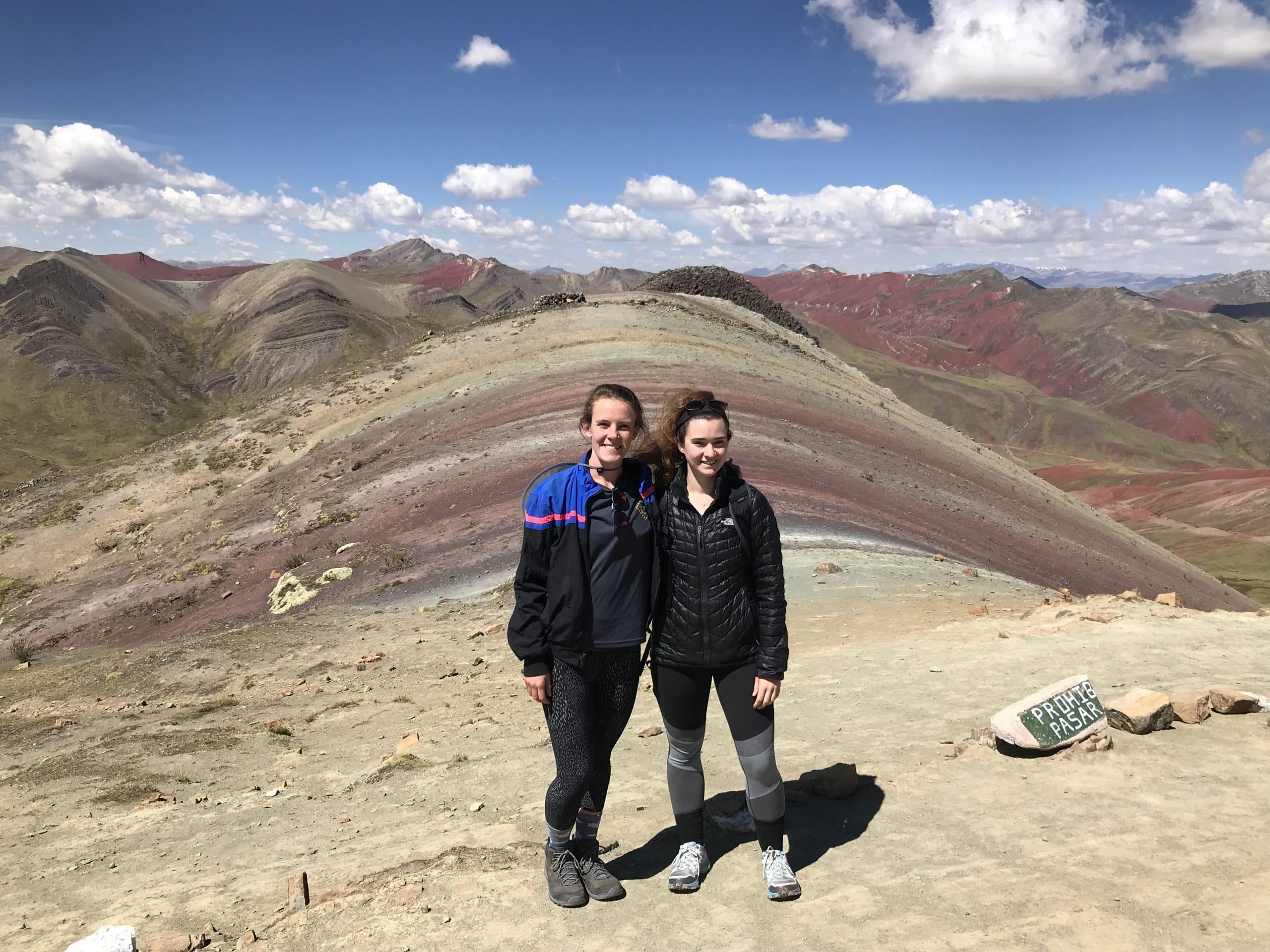 WTA - Women Travelers with the stunning Rainbow Mountain