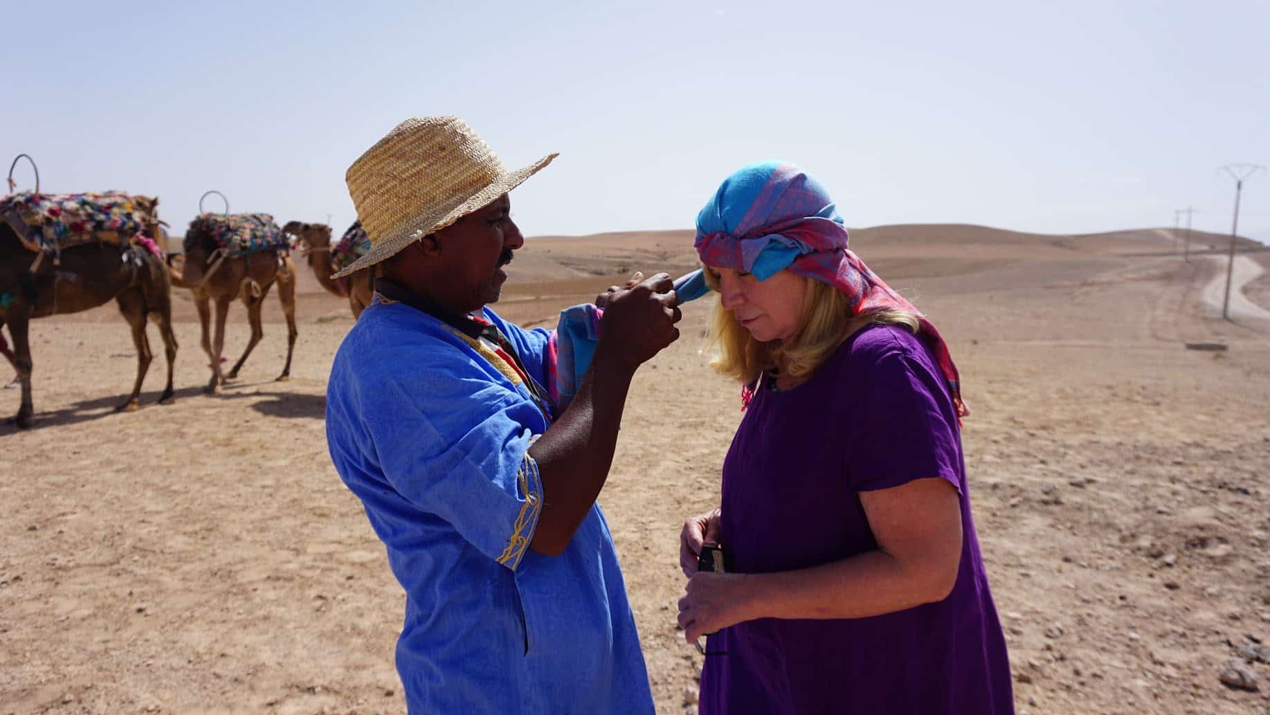 A WTA traveler taking part in local Moroccan customs