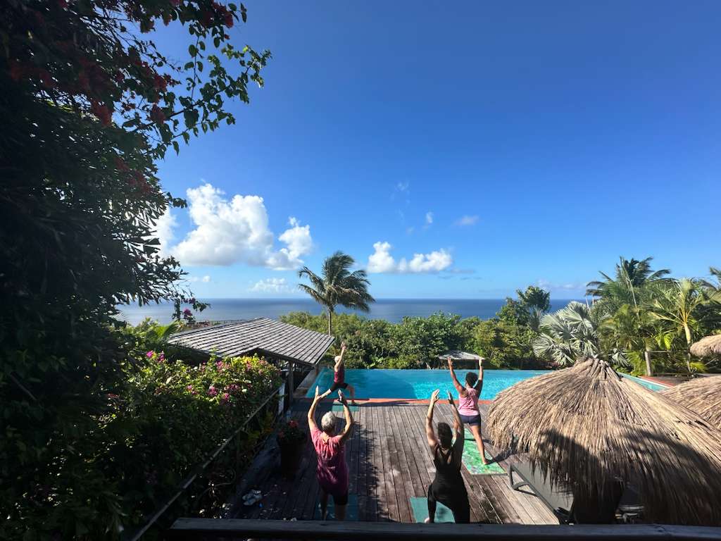 WTA travelers practicing yoga in beautiful St. Lucia