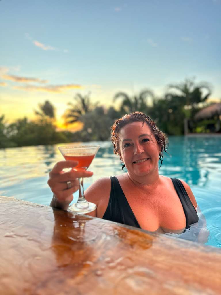 WTA traveler soaking in the St. Lucian sunset poolside