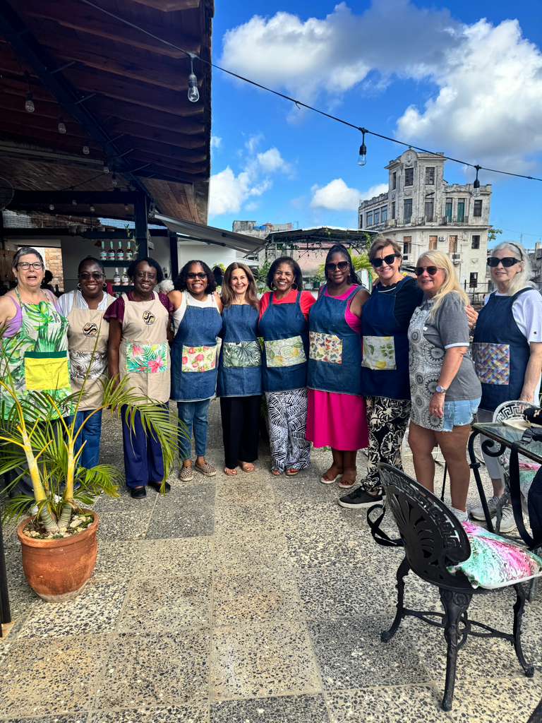 A group of women ready to learn all about Cuban cooking