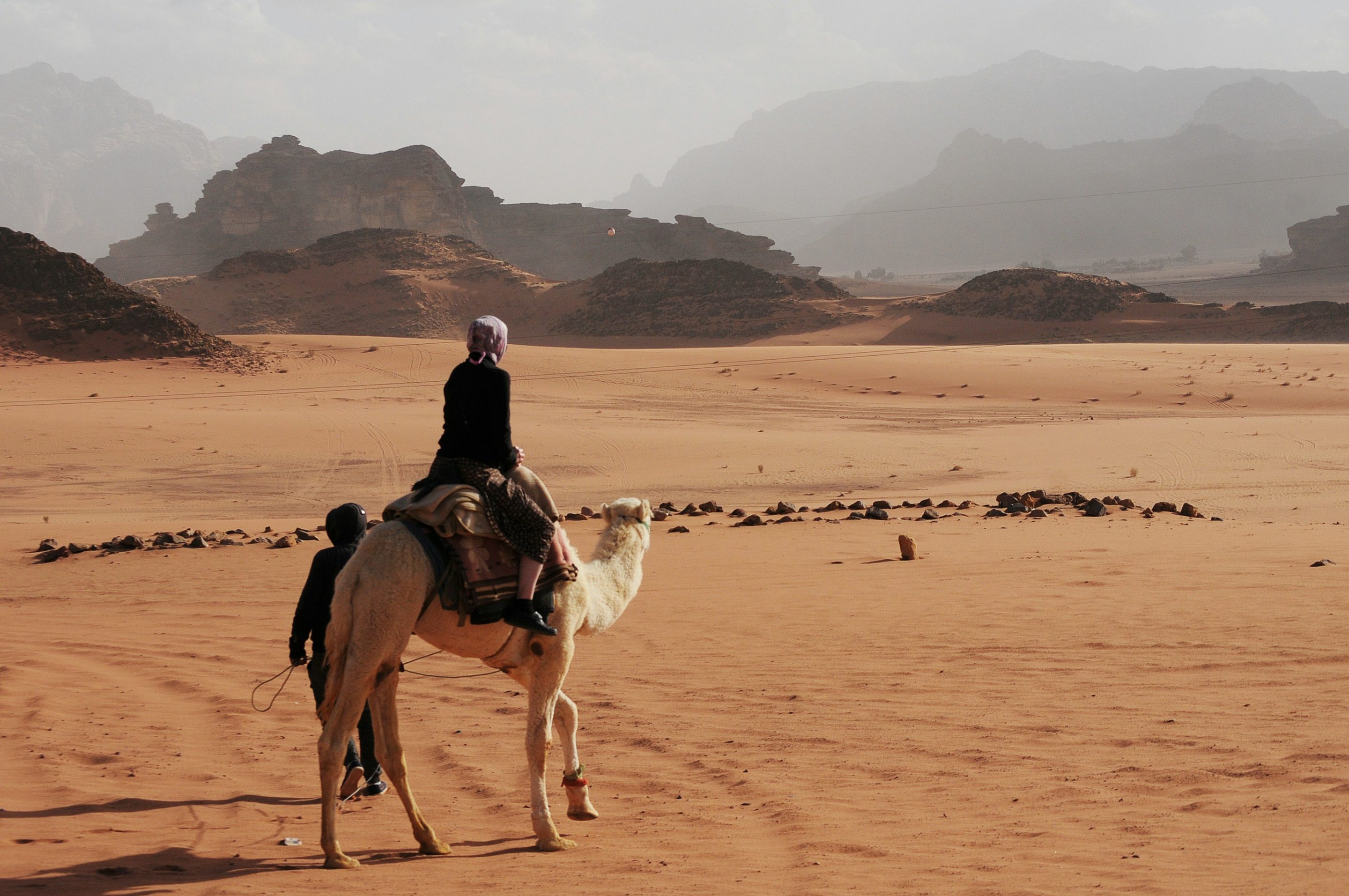 A lone woman traveler roaming the Jordan desert