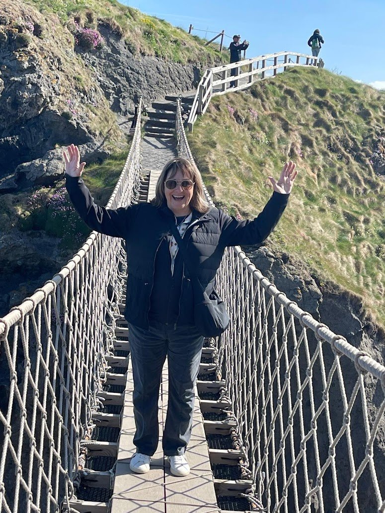 PHOTO-2025-05-06-08-14-48 A WTA woman crossing a bridge in Ireland